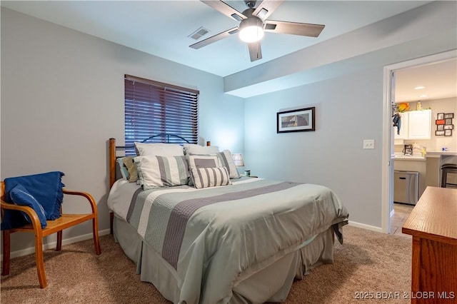 549 Park Place Dr Unit 2D, Kaiser, MO 65047 - bedroom with light colored carpet, baseboards, and a ceiling fan