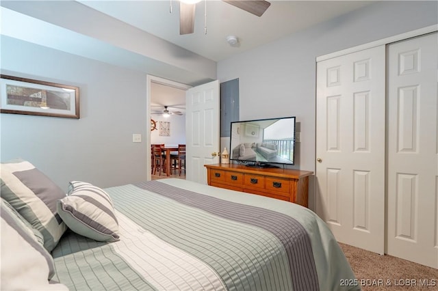 549 Park Place Dr Unit 2D, Kaiser, MO 65047 - bedroom featuring light colored carpet and a ceiling fan