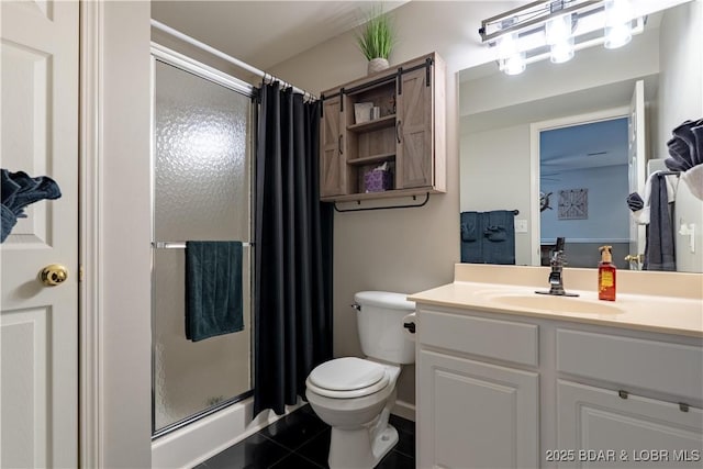 549 Park Place Dr Unit 2D, Kaiser, MO 65047 - bathroom with a shower stall, toilet, vanity, and tile patterned flooring
