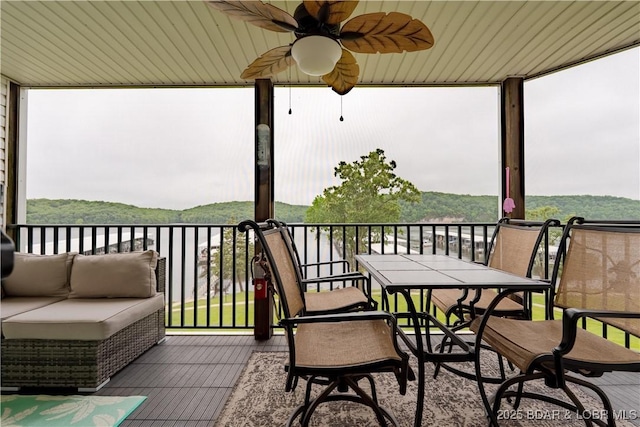 549 Park Place Dr Unit 2D, Kaiser, MO 65047 - wooden terrace featuring a ceiling fan