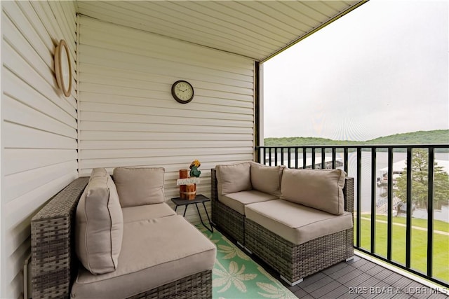 549 Park Place Dr Unit 2D, Kaiser, MO 65047 - balcony with an outdoor living space