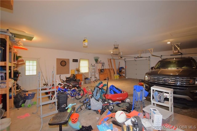 189 S Branch Ln, Eldon, MO 65026 - garage featuring a garage door opener