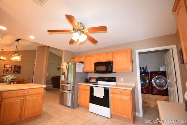 189 S Branch Ln, Eldon, MO 65026 - kitchen with white range with electric cooktop, black microwave, independent washer and dryer, stainless steel fridge, and light countertops