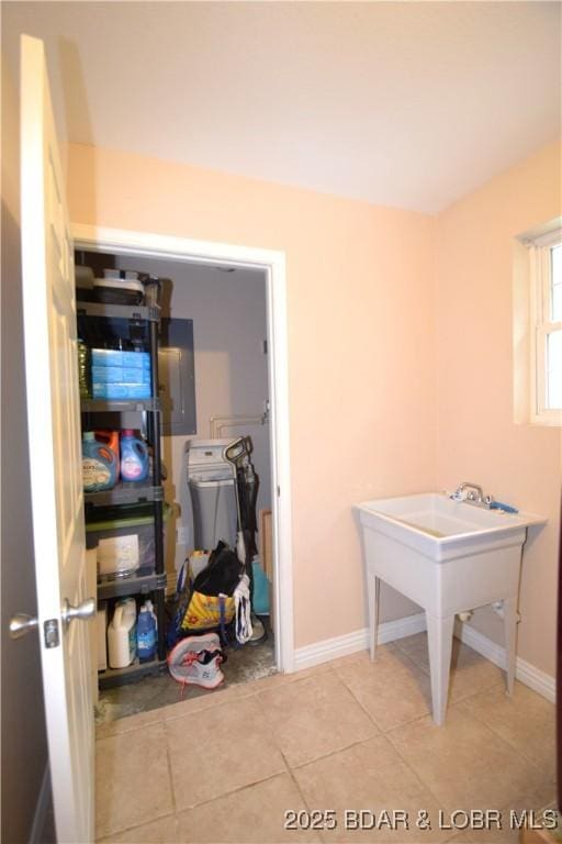 189 S Branch Ln, Eldon, MO 65026 - interior space featuring tile patterned flooring, baseboards, and electric panel