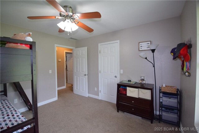 189 S Branch Ln, Eldon, MO 65026 - bedroom with carpet flooring, baseboards, and a ceiling fan