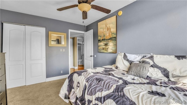 101 Circle Edge Unit 20-3A, Lake Ozark, MO 65049 - bedroom featuring carpet flooring, a closet, and a ceiling fan