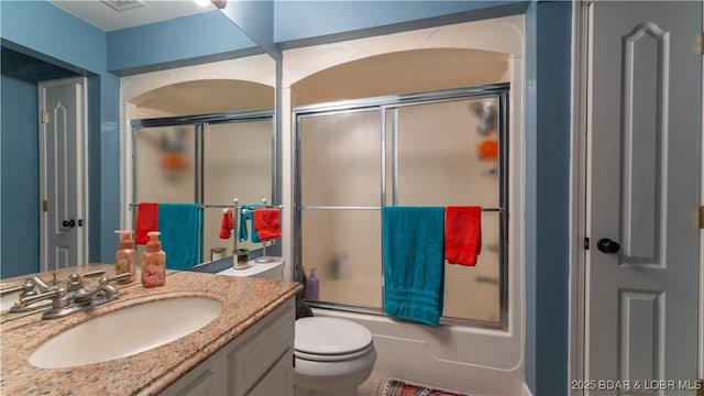 101 Circle Edge Unit 20-3A, Lake Ozark, MO 65049 - full bath with vanity, toilet, and shower / bath combination with glass door