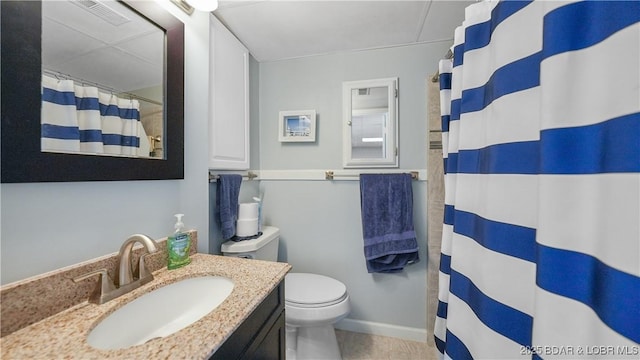 88 Hendrix Haven Dr, Sunrise Beach, MO 65079 - full bathroom with toilet, vanity, a shower with shower curtain, and baseboards