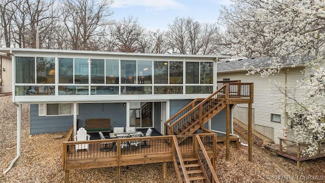 88 Hendrix Haven Dr, Sunrise Beach, MO 65079 - rear view of house with a sunroom, stairs, and a deck