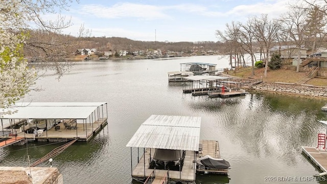 88 Hendrix Haven Dr, Sunrise Beach, MO 65079 - dock area with boat lift and a water view