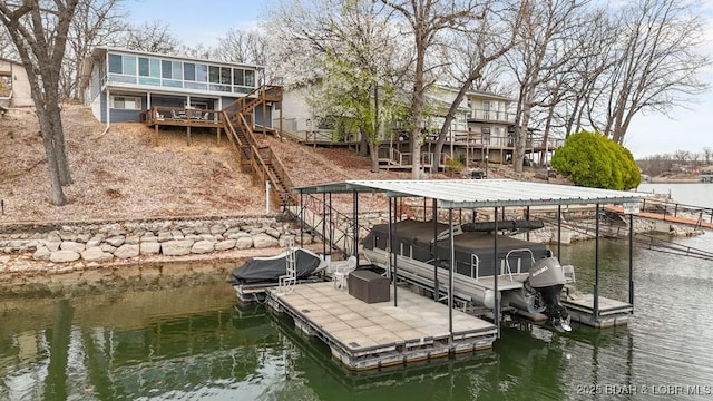 88 Hendrix Haven Dr, Sunrise Beach, MO 65079 - dock featuring stairway, a water view, and boat lift