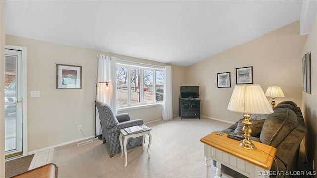 88 Hendrix Haven Dr, Sunrise Beach, MO 65079 - carpeted living room with vaulted ceiling and baseboards
