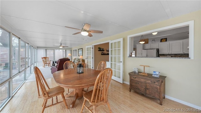 88 Hendrix Haven Dr, Sunrise Beach, MO 65079 - dining space with a ceiling fan, light wood-style floors, baseboards, and french doors