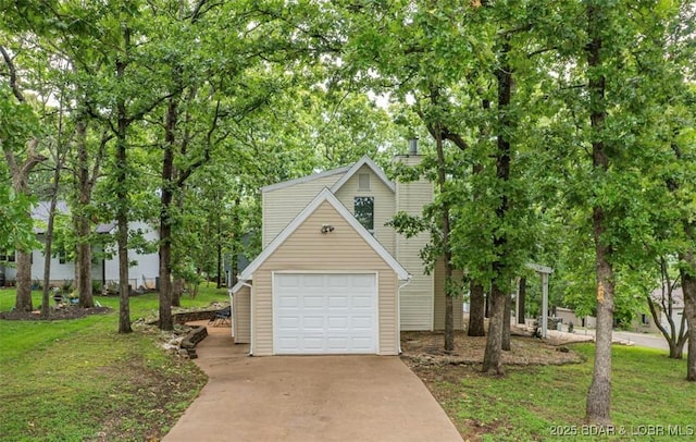 1556 Mockingbird Ln, Osage Beach, MO 65065 - view of front of house with concrete driveway, a garage, and a front yard
