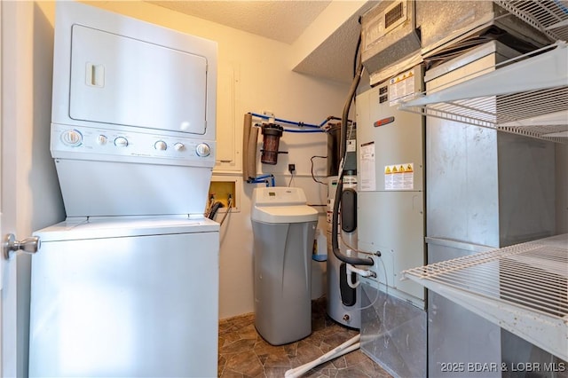 1556 Mockingbird Ln, Osage Beach, MO 65065 - washroom with stacked washing machine and dryer