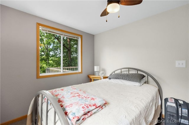 29825 Button Wood Ln, Rocky Mount, MO 65072 - bedroom featuring carpet floors, baseboards, and a ceiling fan