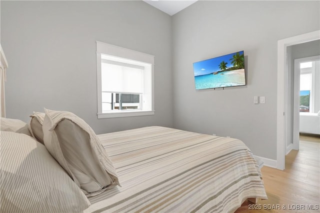 152 Pearl Ln, Climax Springs, MO 65324 - bedroom with light wood-style flooring and baseboards