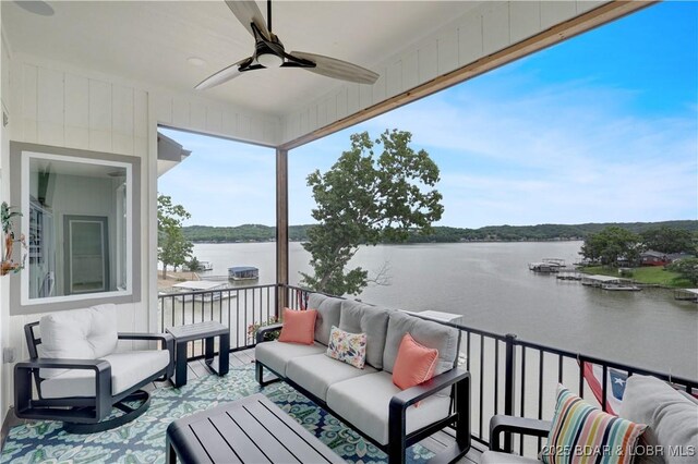 152 Pearl Ln, Climax Springs, MO 65324 - balcony with a water view, an outdoor hangout area, and ceiling fan
