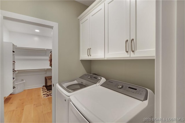 152 Pearl Ln, Climax Springs, MO 65324 - laundry room featuring cabinet space, washing machine and clothes dryer, light wood-type flooring, and recessed lighting
