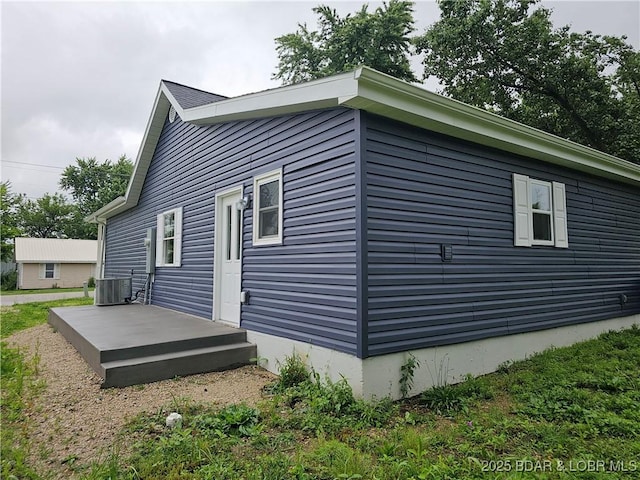 608 8th St, Eldon, MO 65026 - view of property exterior featuring central AC unit