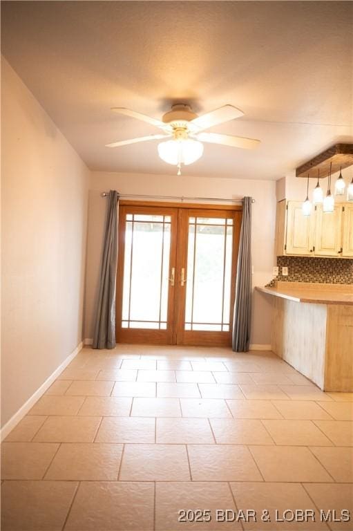 18 Chippewa Dr, Eldon, MO 65026 - doorway to outside featuring ceiling fan, french doors, and baseboards