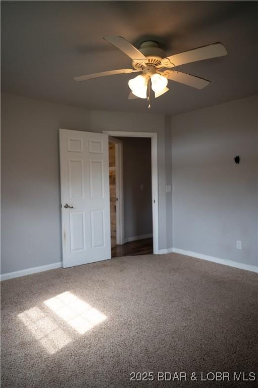 18 Chippewa Dr, Eldon, MO 65026 - unfurnished room featuring carpet, ceiling fan, and baseboards