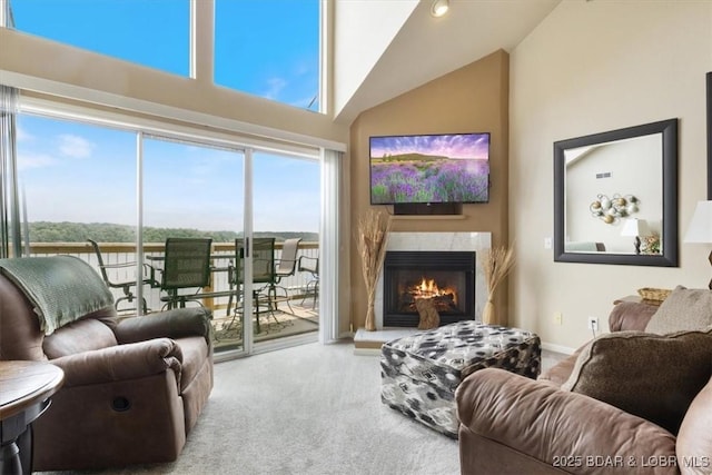 1481 Ledges Dr Unit 1047, Osage Beach, MO 65065 - living area featuring carpet, a fireplace, and vaulted ceiling