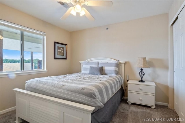 1481 Ledges Dr Unit 1047, Osage Beach, MO 65065 - bedroom with carpet, a closet, and a ceiling fan