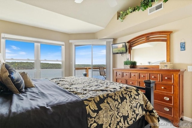 1481 Ledges Dr Unit 1047, Osage Beach, MO 65065 - bedroom featuring access to exterior and vaulted ceiling