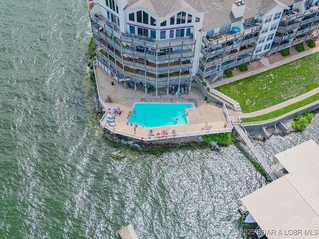 1481 Ledges Dr Unit 1047, Osage Beach, MO 65065 - bird's eye view of a pool and a nearby body of water
