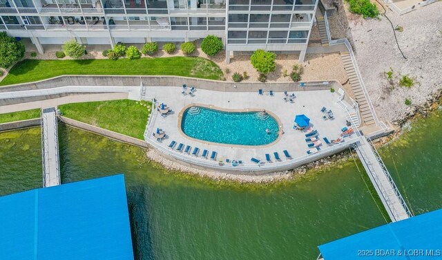 1481 Ledges Dr Unit 1047, Osage Beach, MO 65065 - bird's eye view of a nearby body of water and a pool