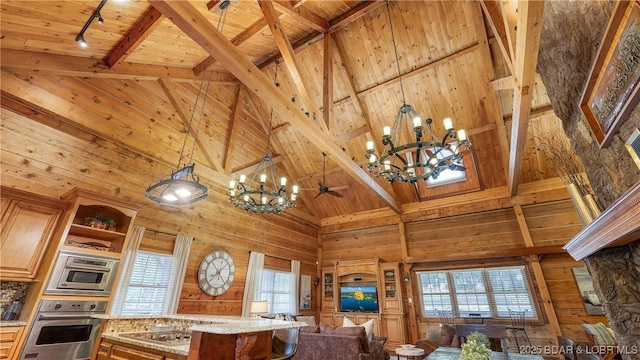 1624 Kays Point Rd, Four Seasons, MO 65049 - kitchen featuring a chandelier, high vaulted ceiling, appliances with stainless steel finishes, wooden ceiling with exposed beams, and open floor plan