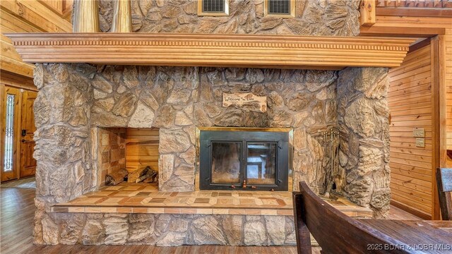 1624 Kays Point Rd, Four Seasons, MO 65049 - detailed view of wood finished floors and a stone fireplace