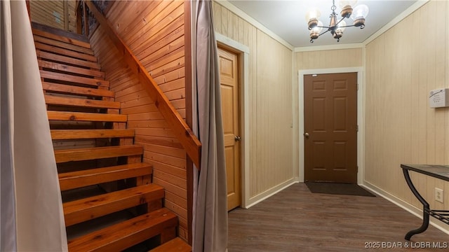 1624 Kays Point Rd, Four Seasons, MO 65049 - entryway with baseboards, a chandelier, dark wood-style floors, ornamental molding, and stairs