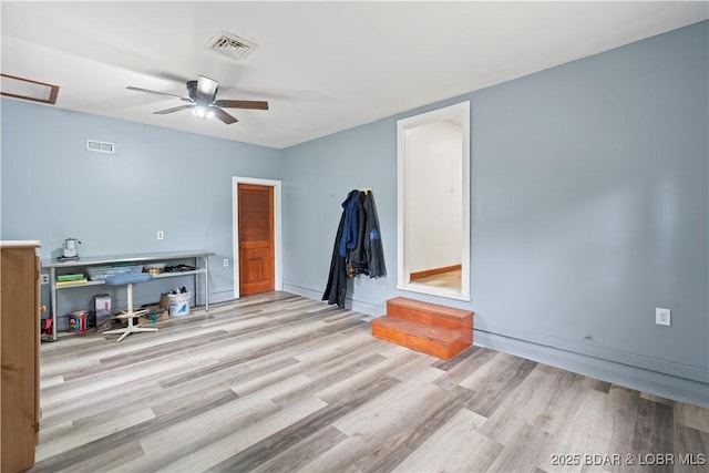 320 N Chestnut St, Eldon, MO 65026 - unfurnished room featuring a ceiling fan and wood finished floors