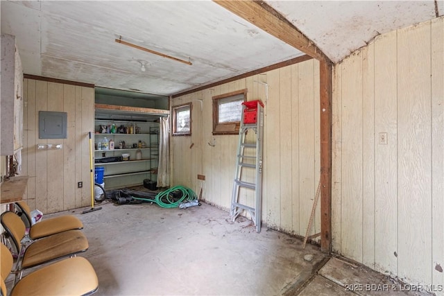 320 N Chestnut St, Eldon, MO 65026 - below grade area featuring wood walls and electric panel