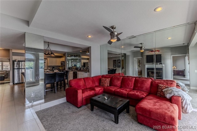 757 Malibu Rd Unit A102, Osage Beach, MO 65065 - living room featuring ceiling fan, recessed lighting, and light tile patterned floors