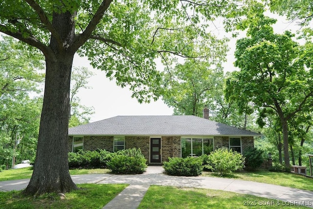 248 Midway Rd, Eldon, MO 65026 - ranch-style house with brick siding, a chimney, and a front yard