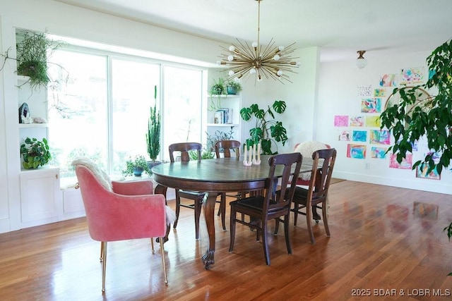 248 Midway Rd, Eldon, MO 65026 - dining room with a chandelier and wood finished floors