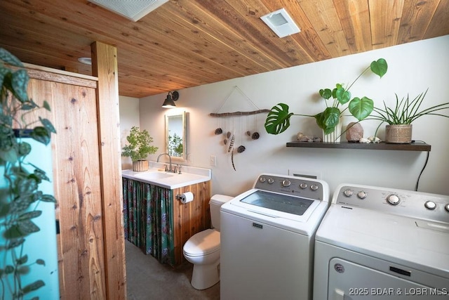 248 Midway Rd, Eldon, MO 65026 - laundry room with independent washer and dryer and wooden ceiling