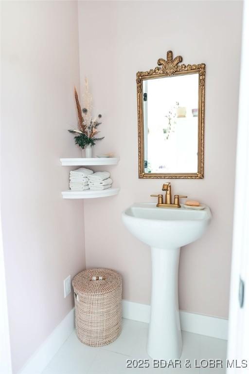 248 Midway Rd, Eldon, MO 65026 - bathroom with baseboards
