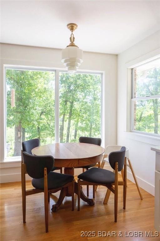248 Midway Rd, Eldon, MO 65026 - dining space featuring healthy amount of natural light, light wood-style flooring, and baseboards
