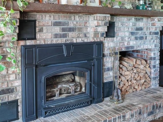 248 Midway Rd, Eldon, MO 65026 - detailed view of a brick fireplace