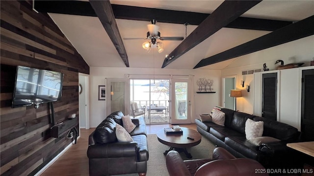 1206 Triple Cove Ln, Climax Springs, MO 65324 - living area featuring wood finished floors, ceiling fan, and wooden walls