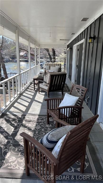 1206 Triple Cove Ln, Climax Springs, MO 65324 - porch with a water view