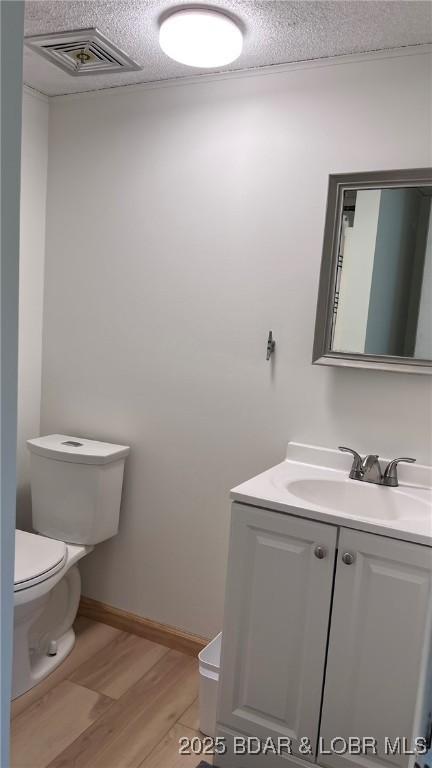 1206 Triple Cove Ln, Climax Springs, MO 65324 - bathroom featuring vanity and wood finished floors