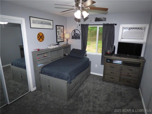 31762 Pecan Dr, Rocky Mount, MO 65072 - carpeted bedroom featuring a wall mounted AC and a ceiling fan