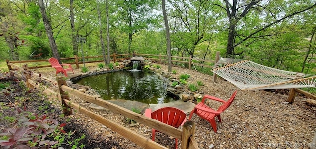 31762 Pecan Dr, Rocky Mount, MO 65072 - fenced backyard featuring a pool