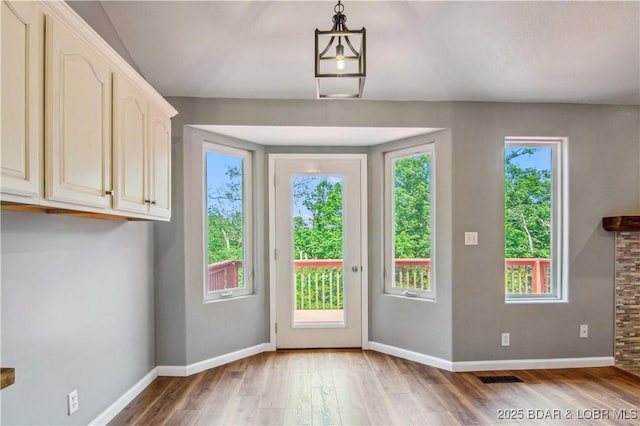 1380 Bluff Dr, Osage Beach, MO 65065 - entryway featuring light wood-style floors and baseboards