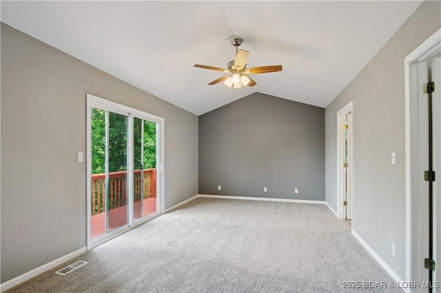 1380 Bluff Dr, Osage Beach, MO 65065 - empty room with ceiling fan, carpet, vaulted ceiling, and baseboards